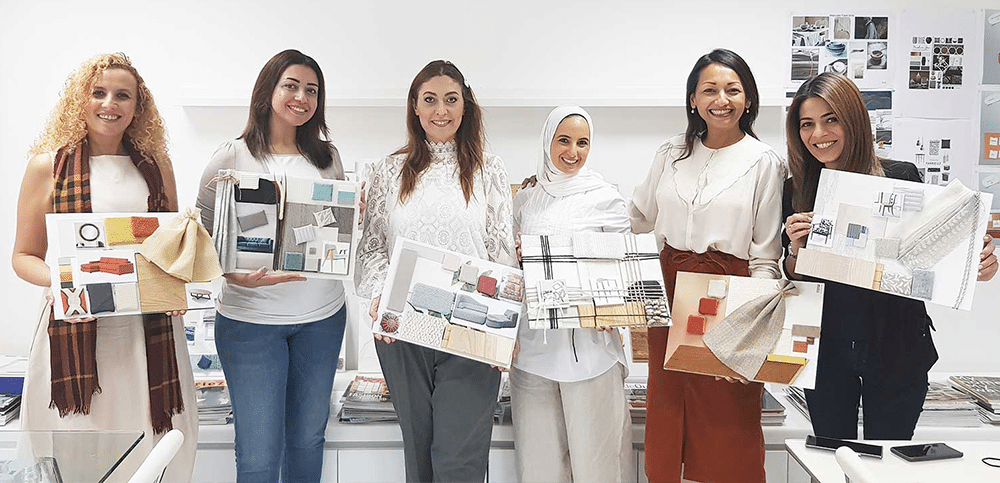 Group of students showcasing work